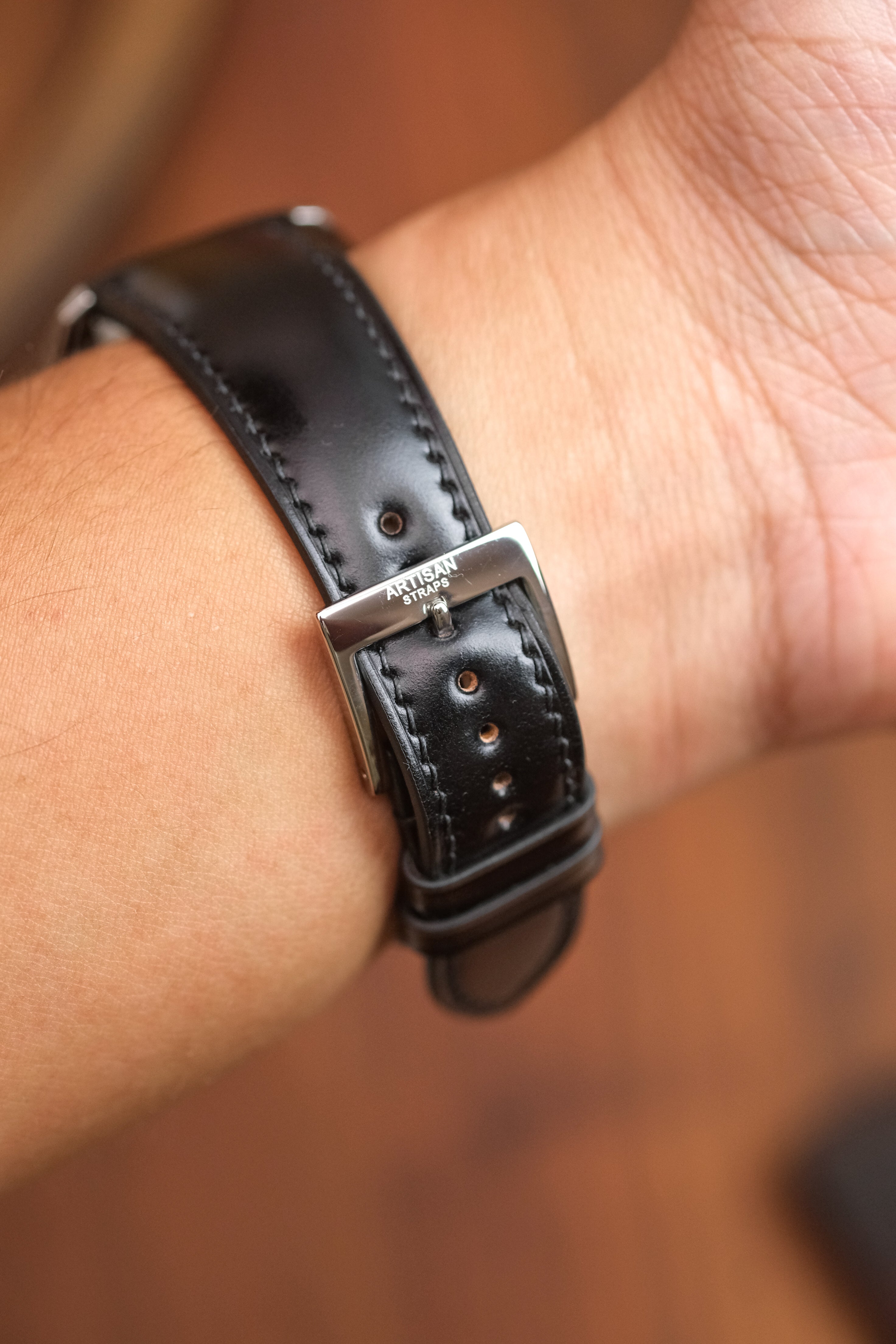 Hebilla distintiva pulida